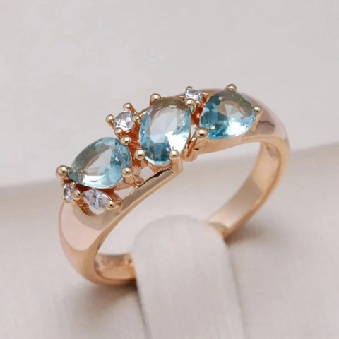 Gold ring with blue zirconia